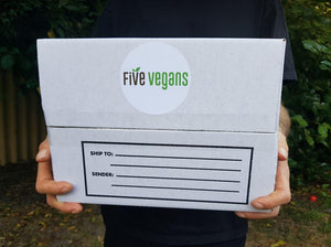 man holding vegan mystery box